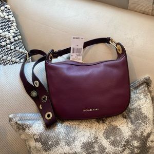Brand New w Tags Michael Kors Raven messenger Bag in Plum $298